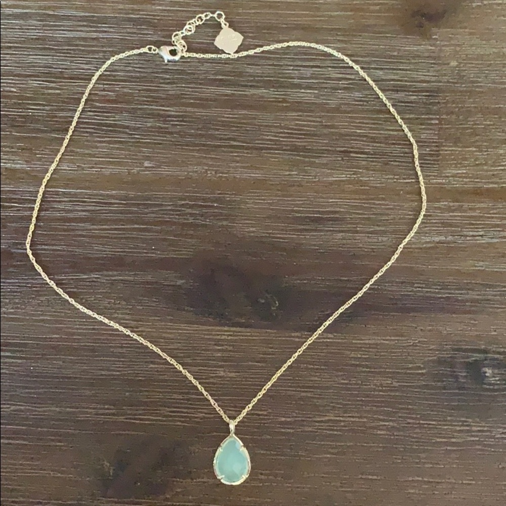 Kendra Scott gold pendant necklace in light blue